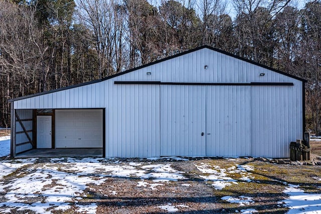 view of snow covered garage