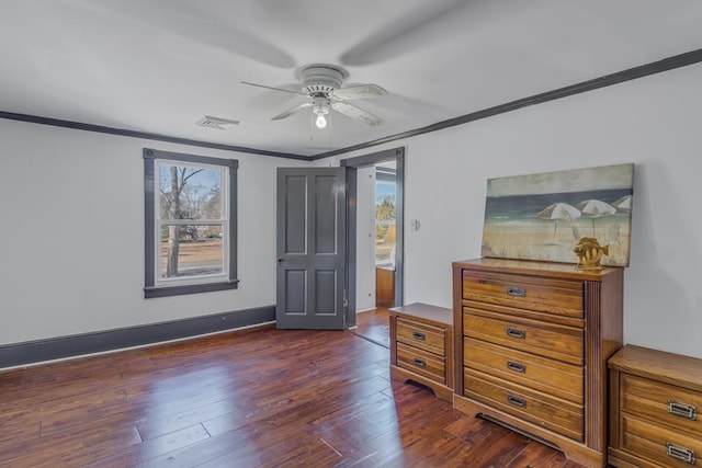 bedroom featuring ceiling fan, crown molding, and dark hardwood / wood-style floors