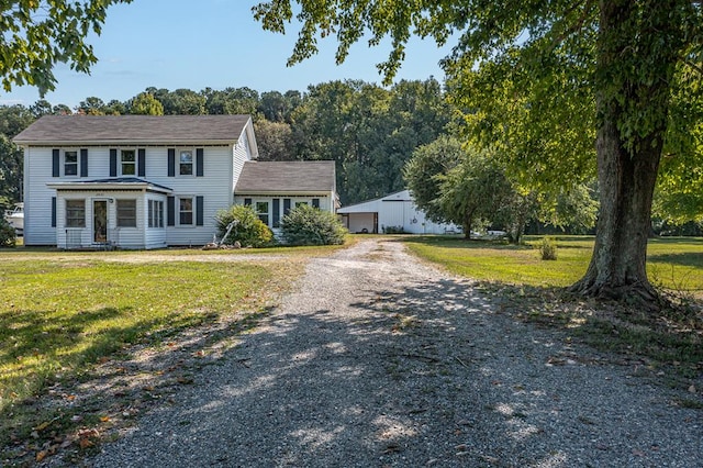 view of front of house featuring a front lawn