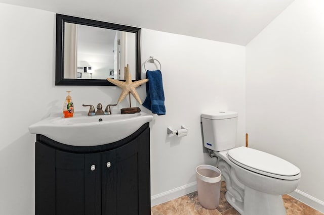 578 Canvasback Ln, Heathsville, VA 22473 - half bath featuring vanity, toilet, and baseboards
