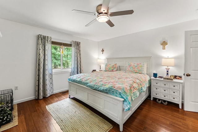 578 Canvasback Ln, Heathsville, VA 22473 - bedroom with dark wood finished floors, baseboards, and ceiling fan