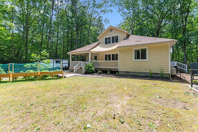 578 Canvasback Ln, Heathsville, VA 22473 - back of house featuring crawl space, a yard, and roof with shingles