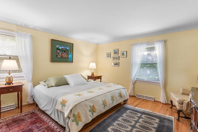 1743 Bushfield Rd, Montross, VA 22520 - bedroom with wood finished floors and ornamental molding