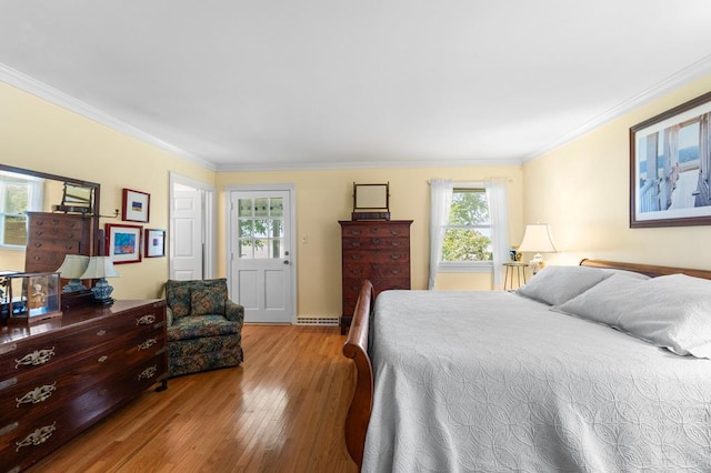 1743 Bushfield Rd, Montross, VA 22520 - bedroom featuring wood finished floors and ornamental molding