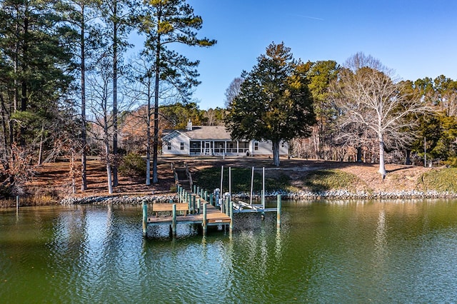 dock area featuring a water view