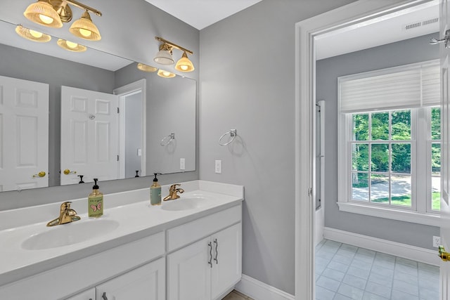 858 Harmony Hills Cir, Heathsville, VA 22473 - full bathroom featuring double vanity and tile patterned flooring