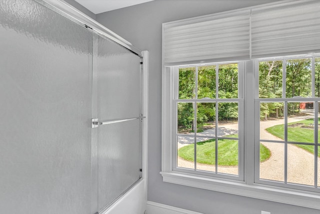 858 Harmony Hills Cir, Heathsville, VA 22473 - bathroom featuring plenty of natural light and combined bath / shower with glass door