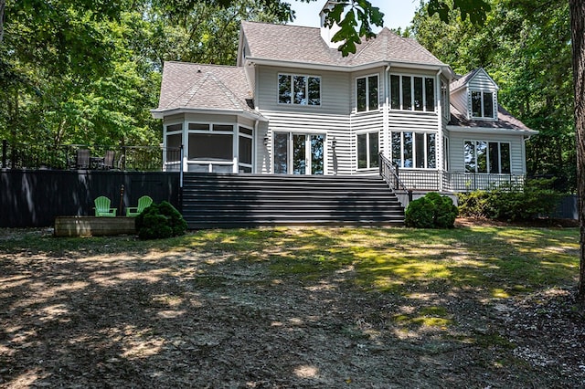 858 Harmony Hills Cir, Heathsville, VA 22473 - back of house with a sunroom, roof with shingles, and a deck
