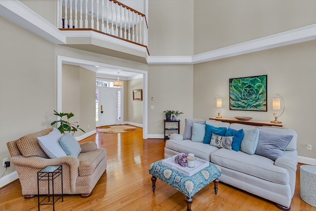 858 Harmony Hills Cir, Heathsville, VA 22473 - living area with wood finished floors and a towering ceiling