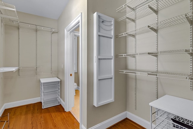 858 Harmony Hills Cir, Heathsville, VA 22473 - spacious closet featuring wood finished floors