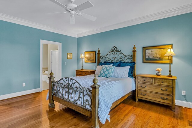 858 Harmony Hills Cir, Heathsville, VA 22473 - bedroom featuring ornamental molding, wood finished floors, ceiling fan, and ensuite bath