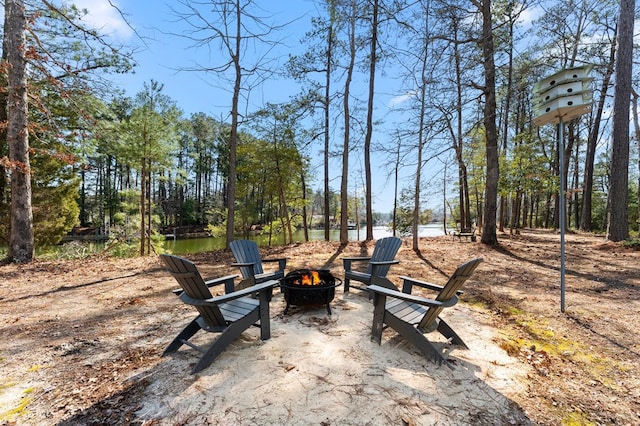 view of yard featuring a fire pit