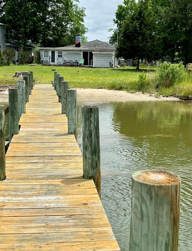 343 Potomac Shore Dr, Heathsville, VA 22473 - dock area featuring a water view and a lawn