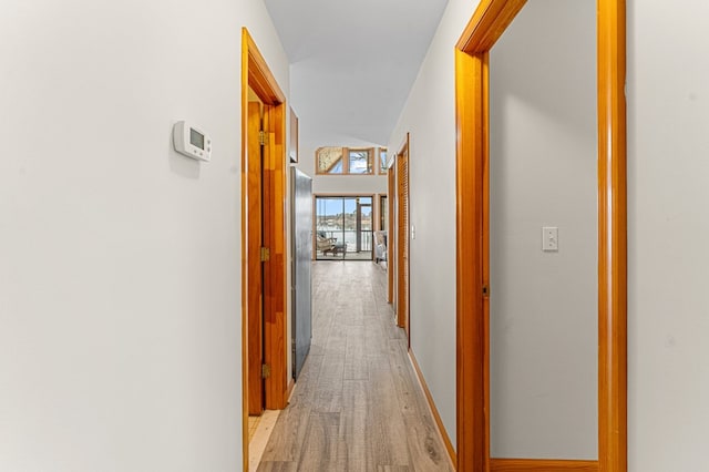 hallway featuring light hardwood / wood-style flooring