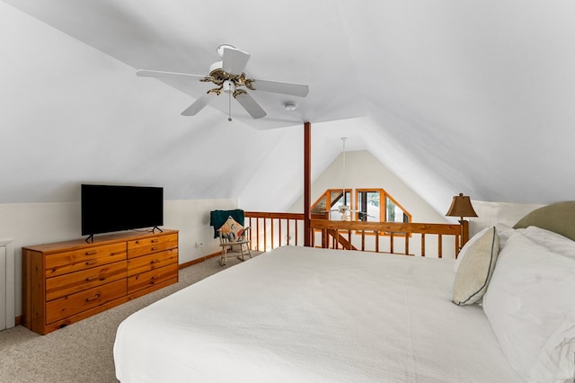 bedroom featuring ceiling fan, carpet, radiator, and lofted ceiling