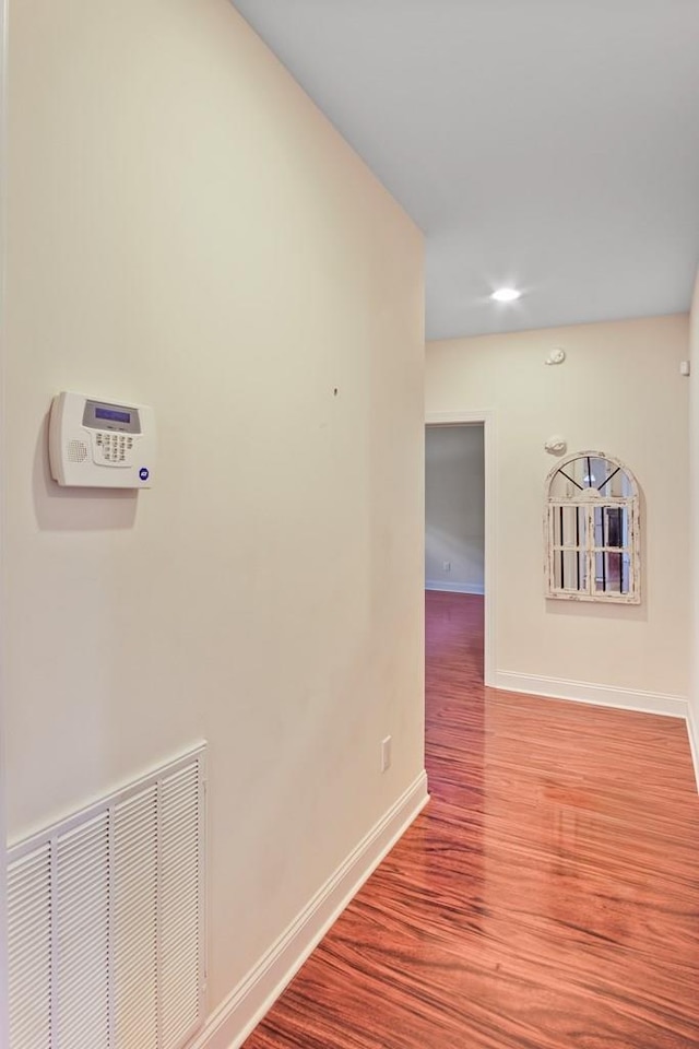 hallway featuring hardwood / wood-style floors