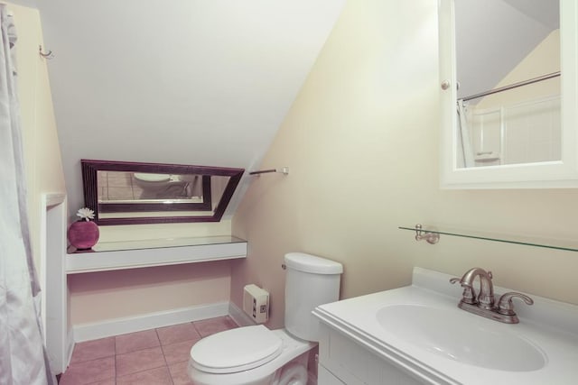 bathroom featuring tile patterned flooring, vanity, and toilet