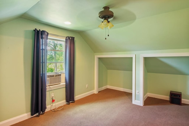 additional living space with carpet, ceiling fan, cooling unit, and vaulted ceiling