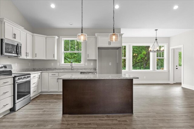 TBD Knights Landing Drive, Heathsville, VA 22473 - kitchen featuring appliances with stainless steel finishes, white cabinets, a center island, a sink, and recessed lighting