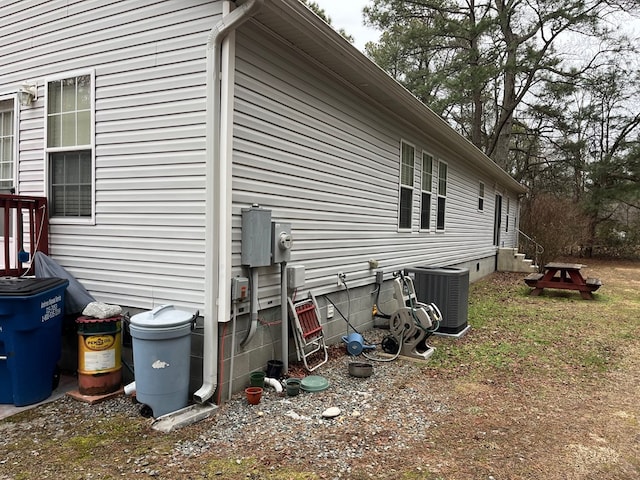 view of home's exterior featuring central air condition unit