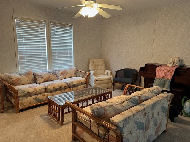 living room featuring ceiling fan and light colored carpet