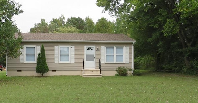 view of front of home featuring a front yard