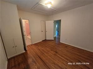300 Irvington Rd, Kilmarnock, VA 22482 - spare room featuring wood finished floors, attic access, and baseboards
