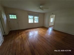 300 Irvington Rd, Kilmarnock, VA 22482 - unfurnished living room with wood finished floors, ceiling fan, and baseboards
