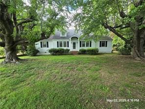 300 Irvington Rd, Kilmarnock, VA 22482 - cape cod house with a front lawn