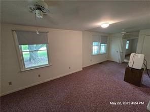 300 Irvington Rd, Kilmarnock, VA 22482 - spare room with baseboards and carpet flooring