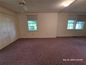 300 Irvington Rd, Kilmarnock, VA 22482 - unfurnished bedroom featuring multiple windows and carpet