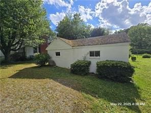300 Irvington Rd, Kilmarnock, VA 22482 - view of home's exterior featuring a lawn