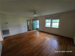 300 Irvington Rd, Kilmarnock, VA 22482 - unfurnished living room with a ceiling fan and wood finished floors