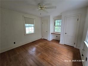 300 Irvington Rd, Kilmarnock, VA 22482 - unfurnished bedroom featuring wood finished floors, multiple closets, baseboards, and ceiling fan