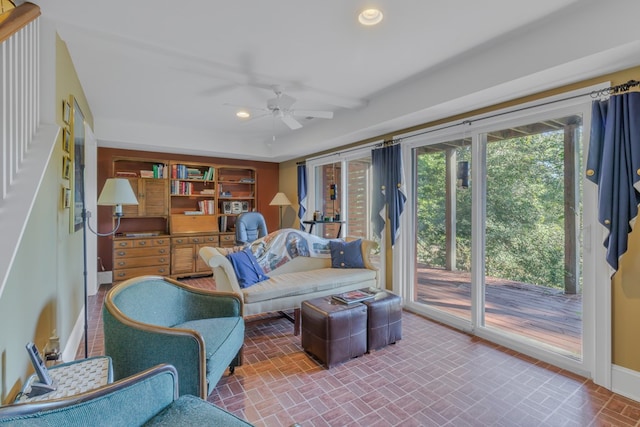 living room with ceiling fan