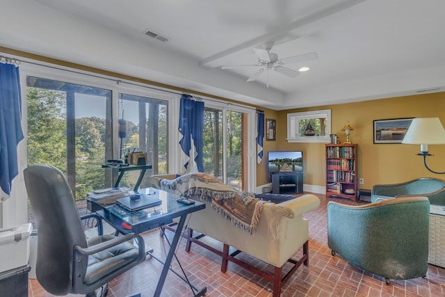 living room with ceiling fan