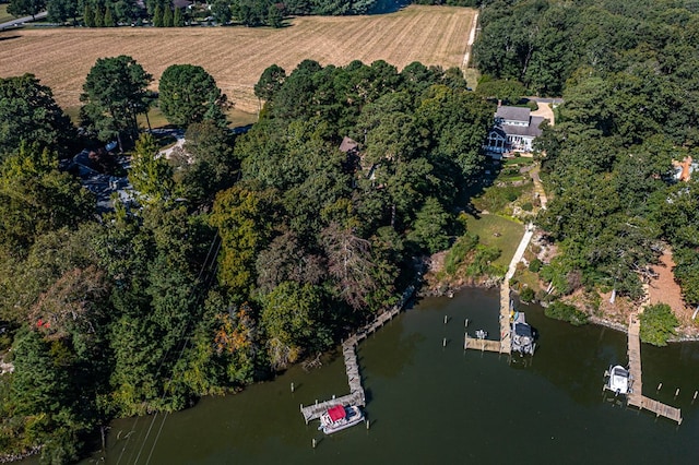 drone / aerial view featuring a water view and a rural view