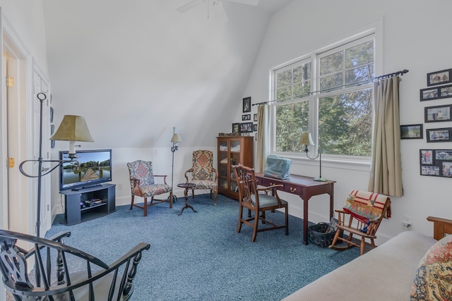 carpeted office with ceiling fan and vaulted ceiling