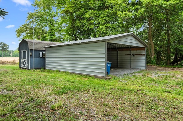 garage with a storage shed and a carport
