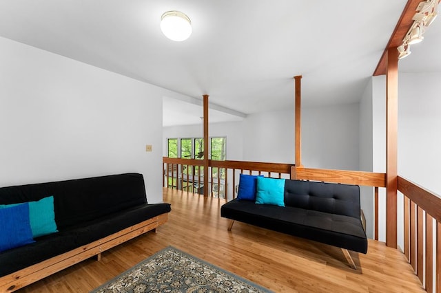 sitting room featuring wood finished floors