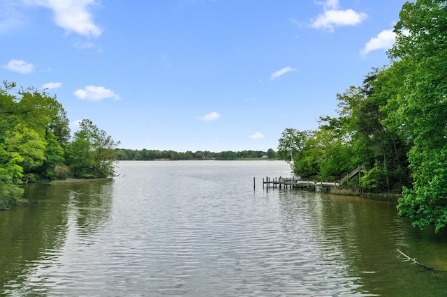 property view of water with a boat dock
