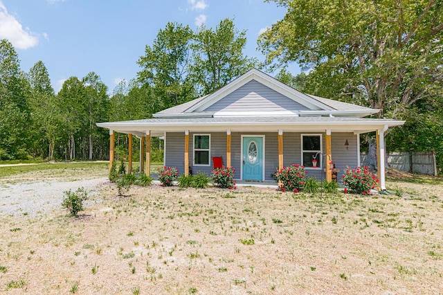 274 Regina Rd, Lancaster, VA 22503 - view of front of house with a porch and fence