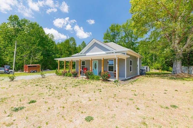 274 Regina Rd, Lancaster, VA 22503 - farmhouse-style home featuring a porch