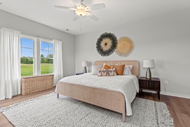 bedroom featuring hardwood / wood-style floors and ceiling fan