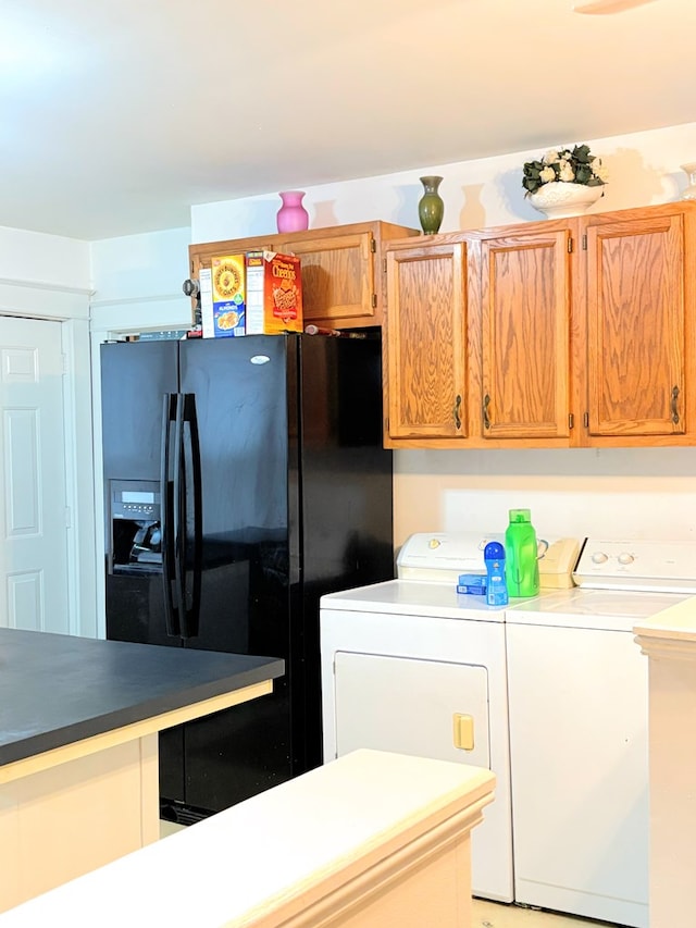clothes washing area with laundry area and washer and dryer
