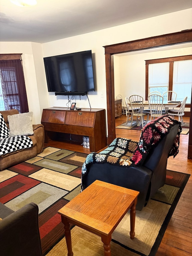 living area featuring hardwood / wood-style floors