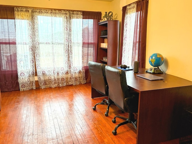 home office featuring hardwood / wood-style floors