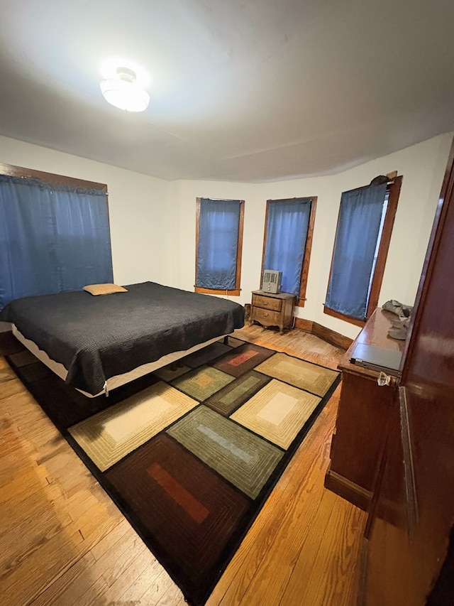 bedroom with light wood-style floors