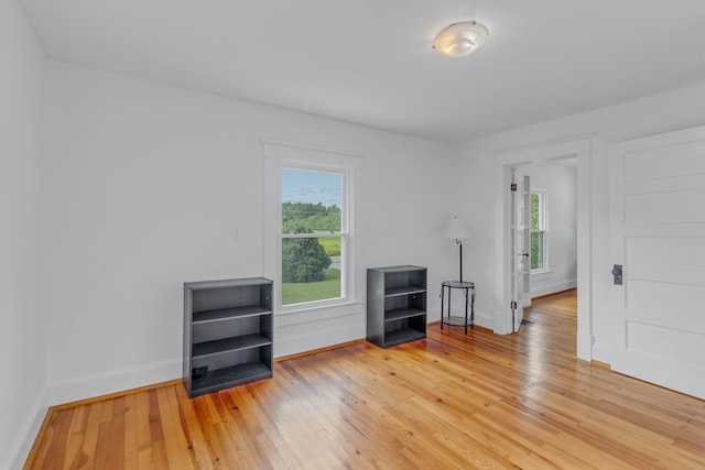 unfurnished room featuring light hardwood / wood-style flooring