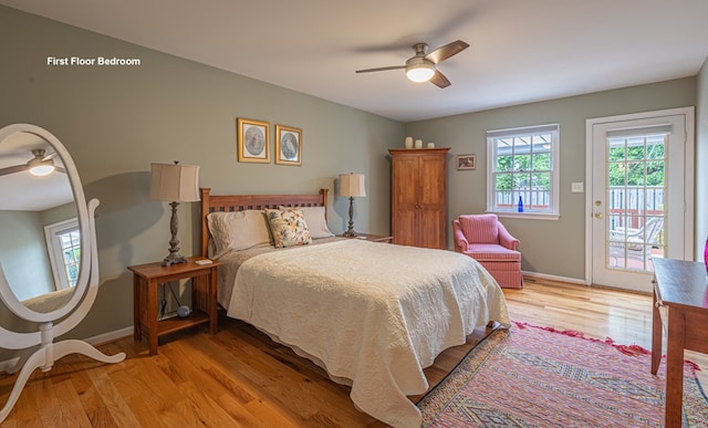 30 Heatherfield Ct, Kilmarnock, VA 22482 - bedroom featuring access to outside, light wood finished floors, and a ceiling fan